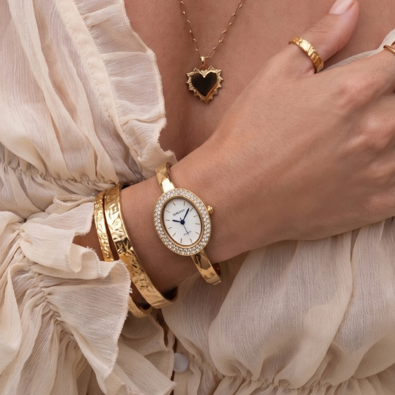 Relógio feminino dourado com bracelete rígido oval com cristal – mostrador branco elegante