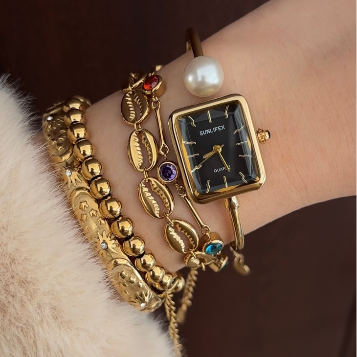 Noir Pearl – Relógio de pulso com pulseira rígida em preto e dourado, elegante