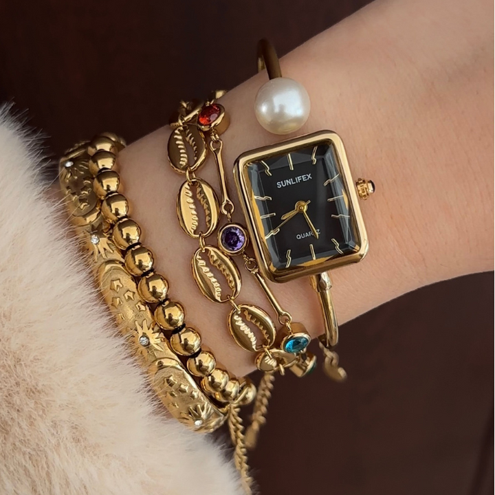 Noir Pearl – Relógio de pulso com pulseira rígida em preto e dourado, elegante