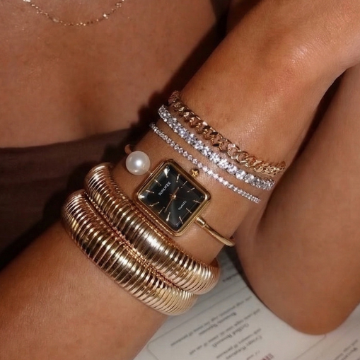 Noir Pearl – Relógio de pulso com pulseira rígida em preto e dourado, elegante
