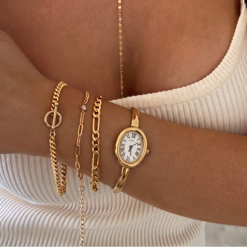 Relógio de pulso feminino dourado elegante com pulseira rígida – Mostrador ovalado branco em formato de banheira