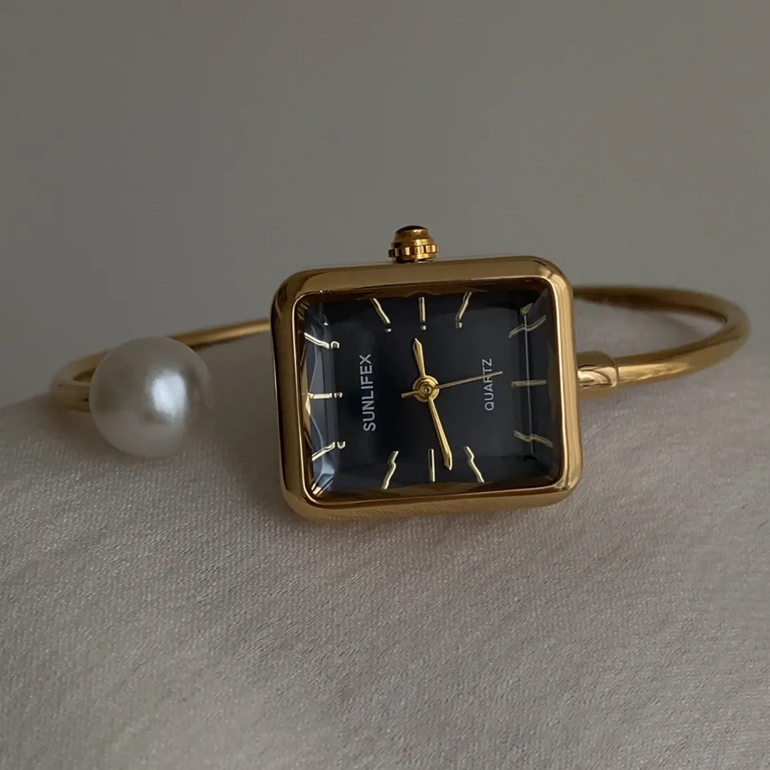 Noir Pearl – Relógio de pulso com pulseira rígida em preto e dourado, elegante