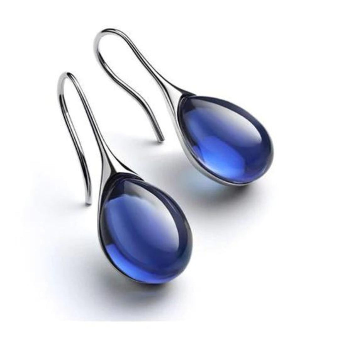 Brincos de cristal em forma de gota em ouro e prata