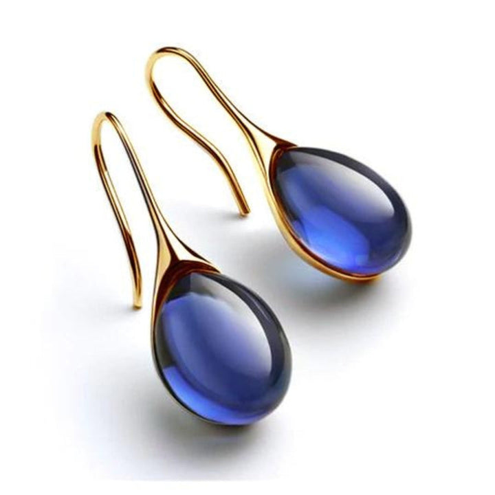Brincos de cristal em forma de gota em ouro e prata