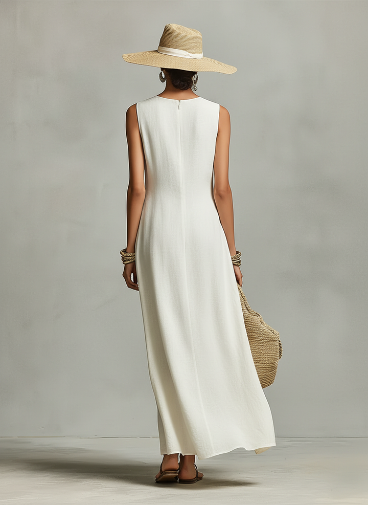 Vestido feminino de linho respirável na cor marfim, com detalhe sem mangas e barra assimétrica, estilo contemporâneo