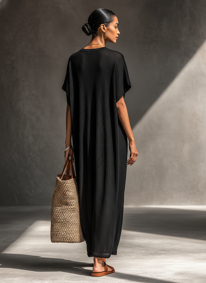 Vestido maxi de malha transparente com mangas curtas