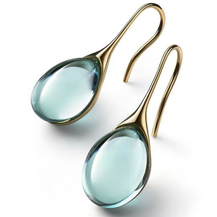 Brincos de cristal em forma de gota em ouro e prata