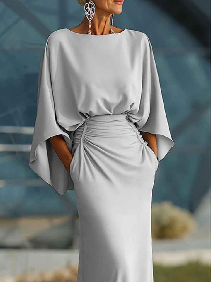 Clara | Vestido elegante com decote em V, costas nuas e mangas