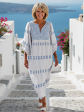 Luna | Vestido maxi bordado com decote em V e mangas compridas