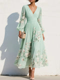 Elga - Vestido maxi plissado em chiffon com padrão floral