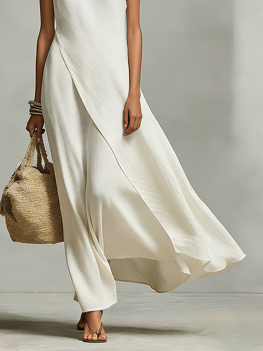 Vestido feminino de linho respirável na cor marfim, com detalhe sem mangas e barra assimétrica, estilo contemporâneo