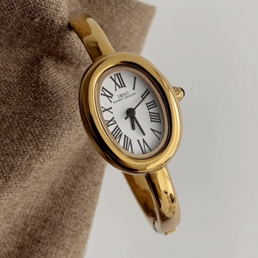 Relógio de pulso feminino dourado elegante com pulseira rígida – Mostrador ovalado branco em formato de banheira