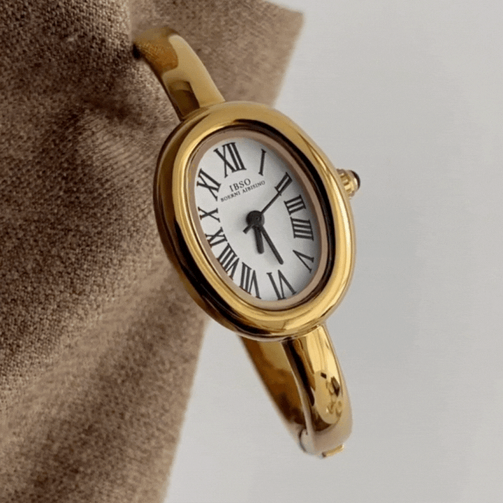 Relógio de pulso feminino dourado elegante com pulseira rígida – Mostrador ovalado branco em formato de banheira