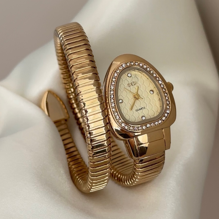Relógio de pulso em ouro com pulseira de serpente – mostrador em forma de serpente e aro com diamantes