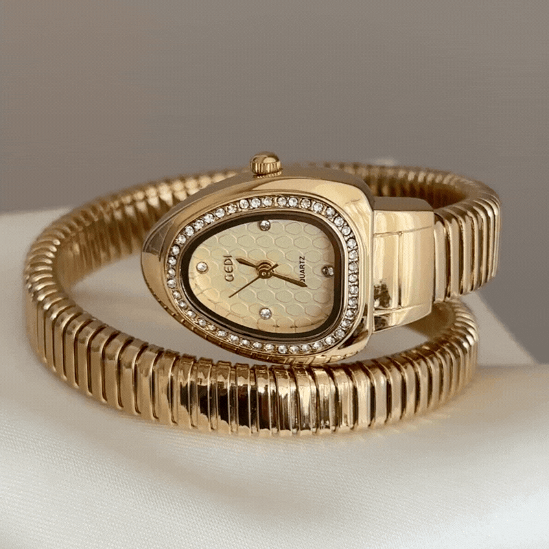 Relógio de pulso em ouro com pulseira de serpente – mostrador em forma de serpente e aro com diamantes