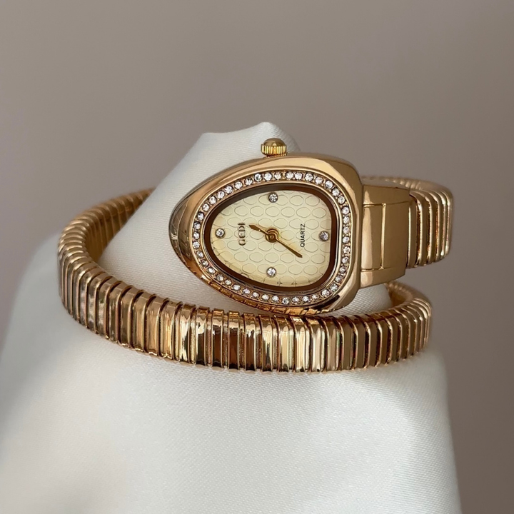 Relógio de pulso em ouro com pulseira de serpente – mostrador em forma de serpente e aro com diamantes
