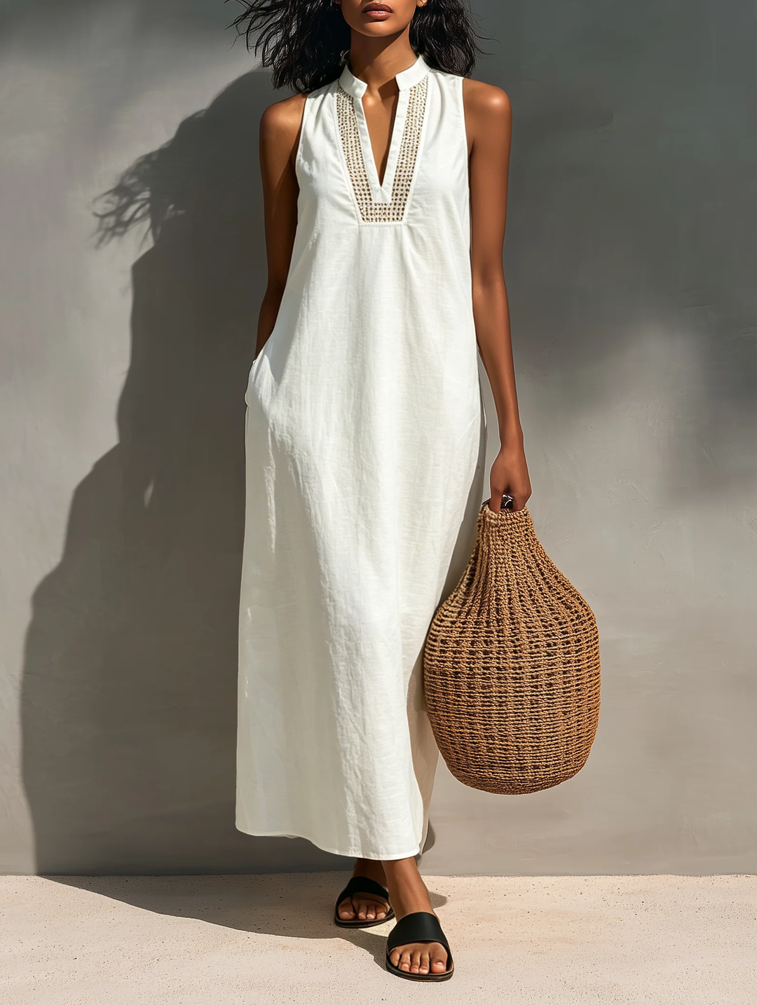 Vestido maxi minimalista sem mangas com decote recortado