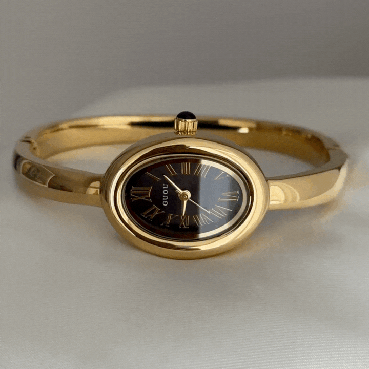 Relógio de pulso feminino preto com caixa tonneau dourada e pulseira rígida – elegante relógio de quartzo